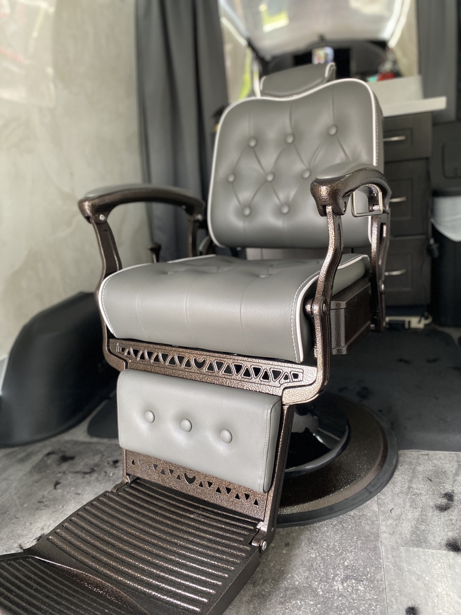 Premium barber chair inside the Curbside Cuts mobile suite